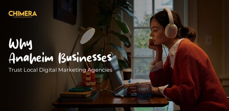 A focused lady typing on her laptop computer connected with headsets on her desk, which explains why Anaheim business organizations like digital marketing agencies want to collaborate with the local ones.